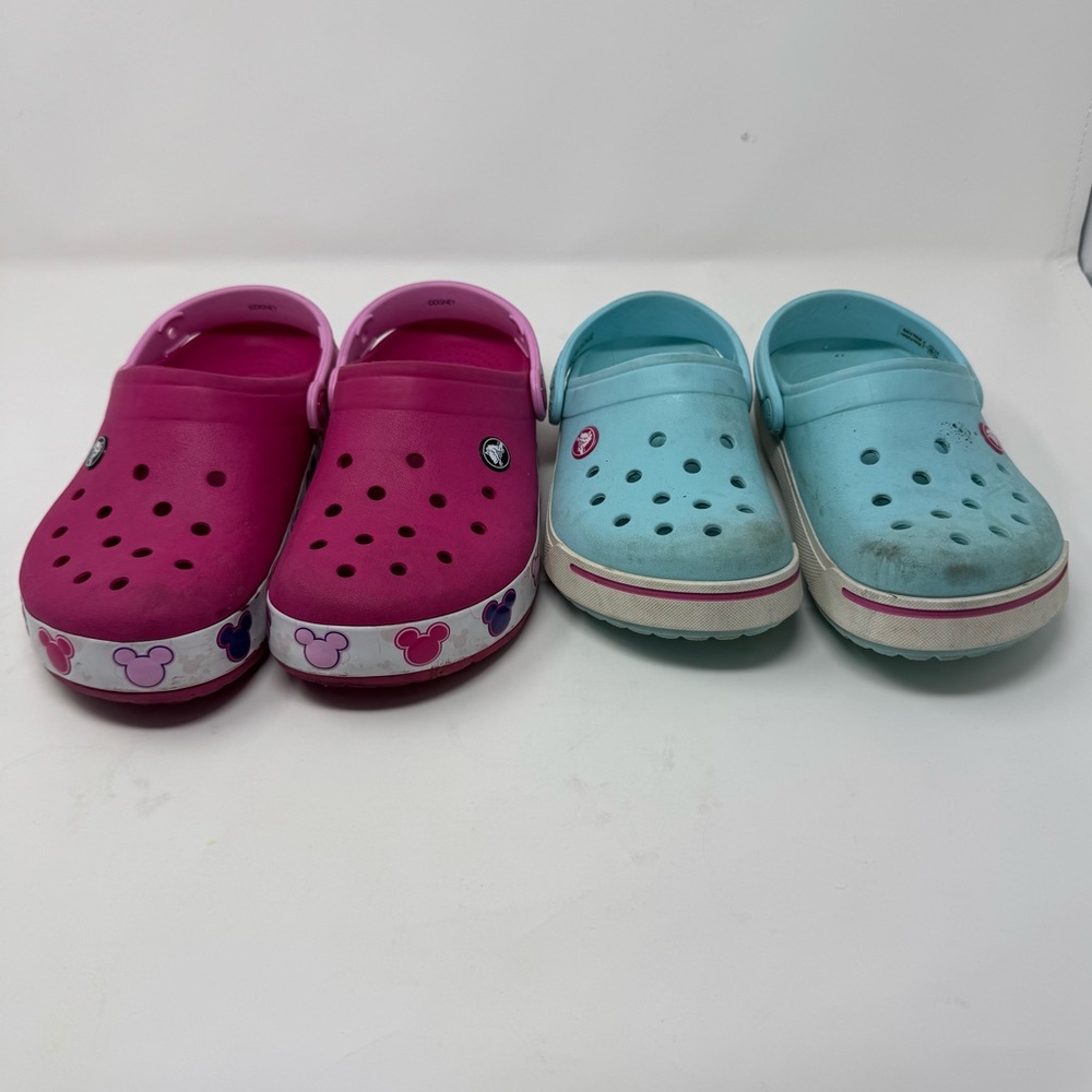 Crocs Bundle- Disney Pink size 3, Blue Size 2, worn a few times.
